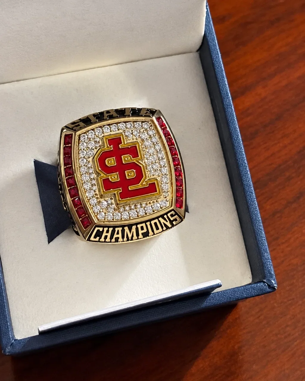 Close-up of Jordynn Riggins' Somerset Losee championship ring resting in its box